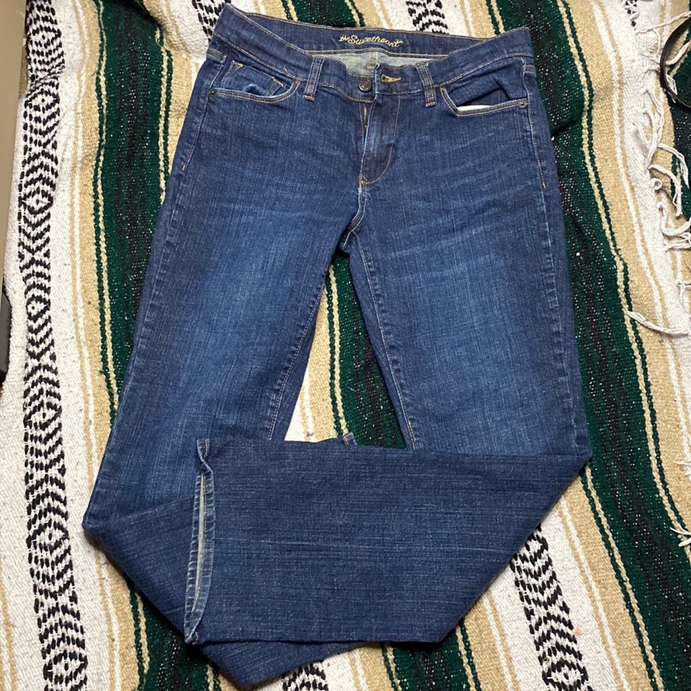 jeans, used to show. bootcut but kinda straight.